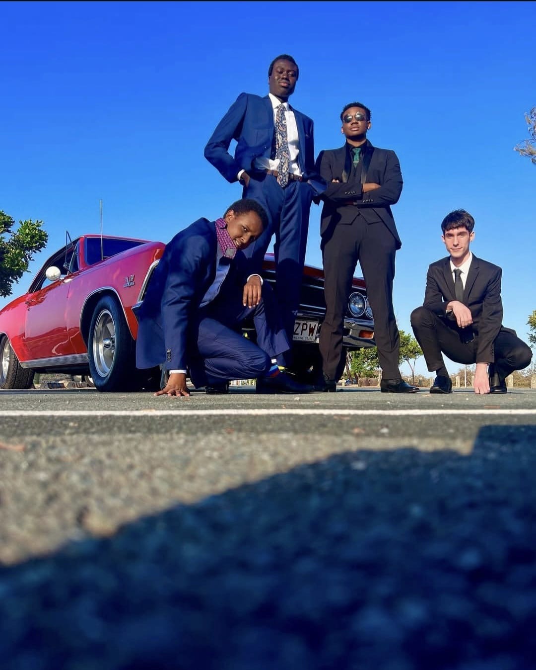 Four boys suited up with the Chevelle