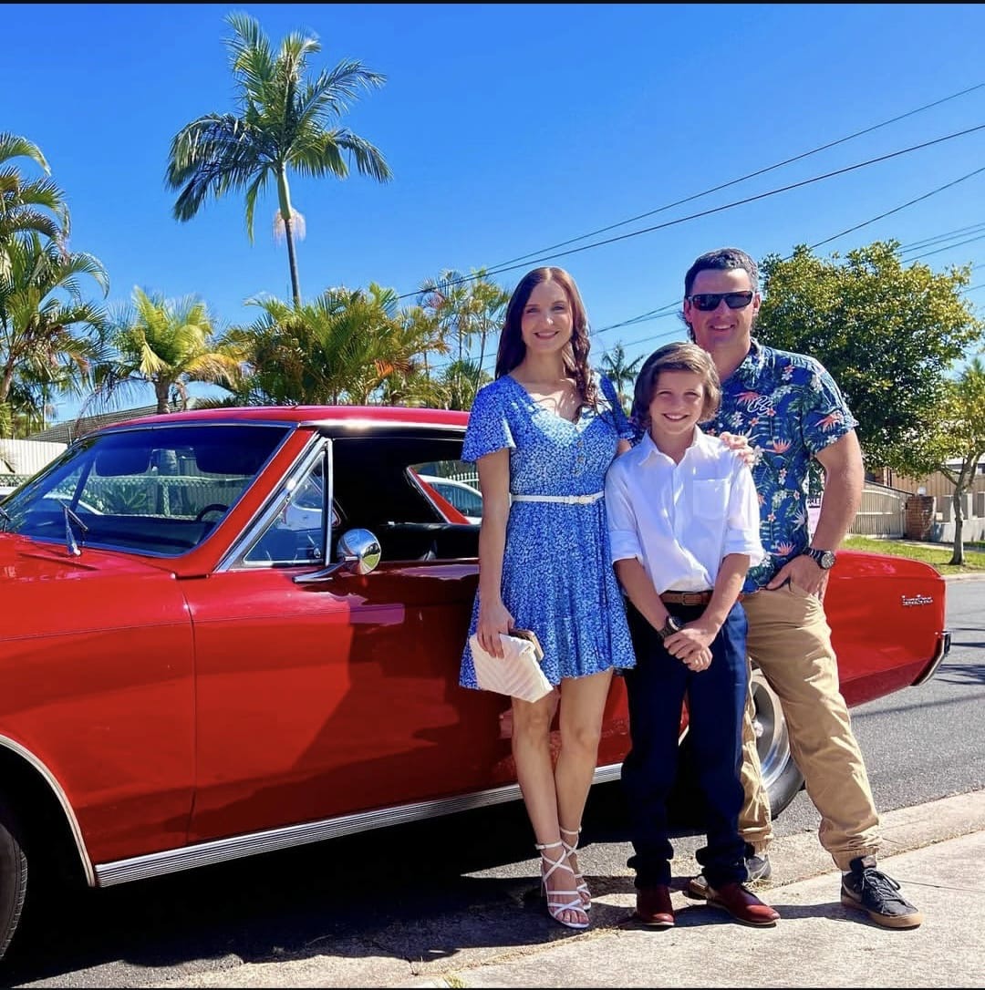 Family posing with the Chevelle