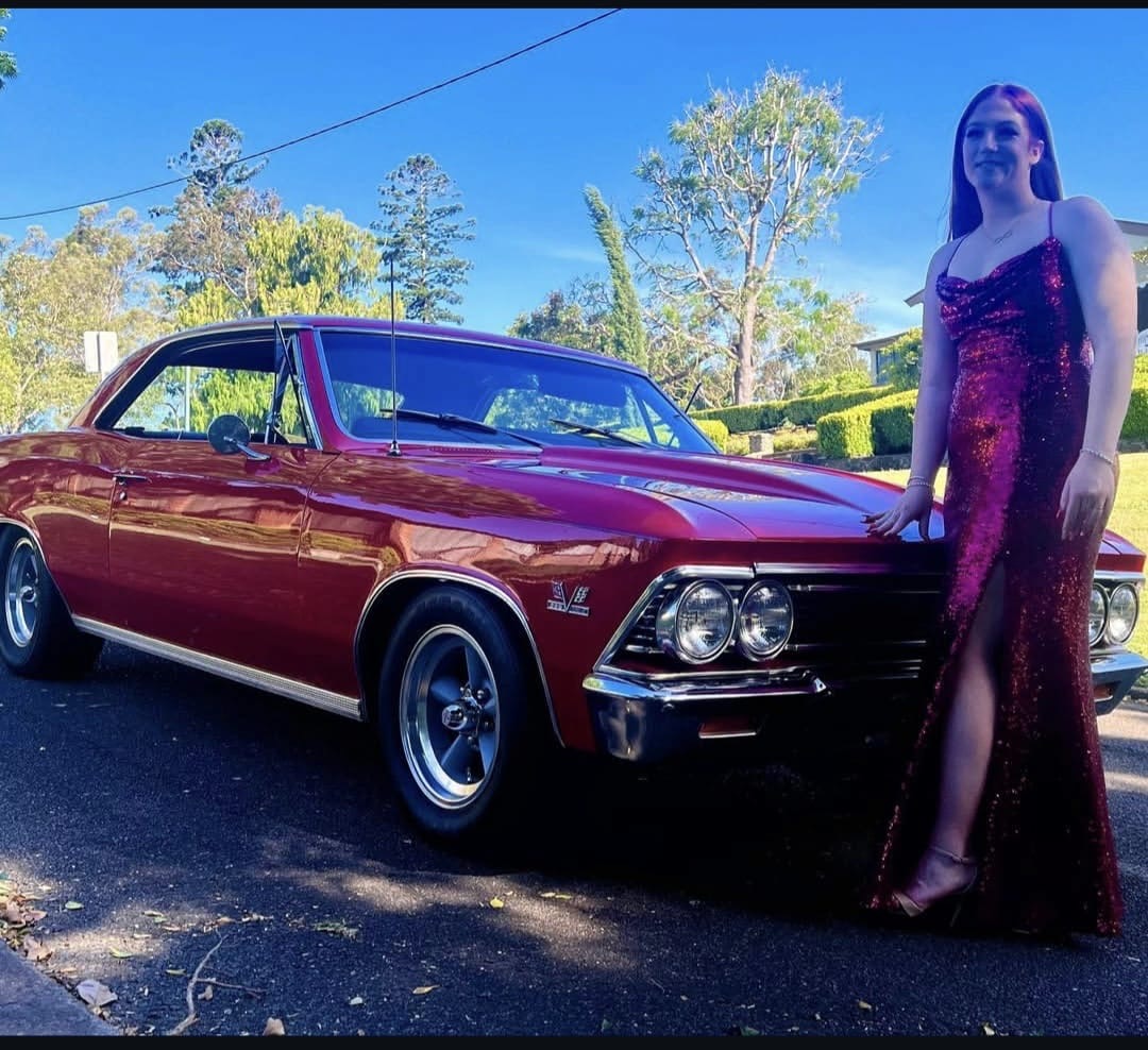 Sequin gown beside the Chevelle